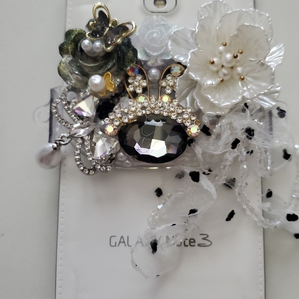 Custom-made Decorative Phone Clip with Floral and Gem Accents